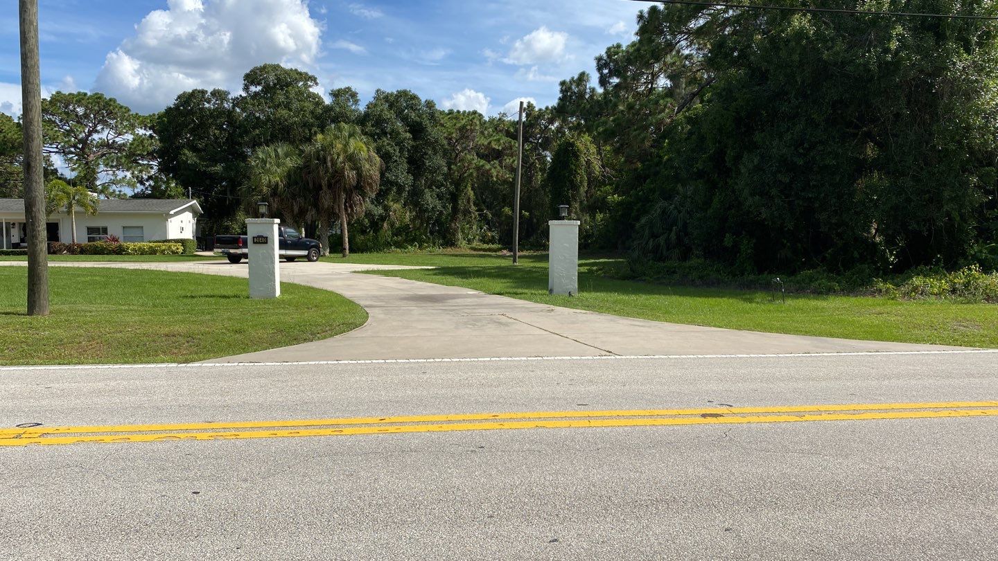Sarasota, FL. Vinyl Fence Installation using Tan Vinyl Louvered Vinyl Fence by Asap fence and gates, LLC