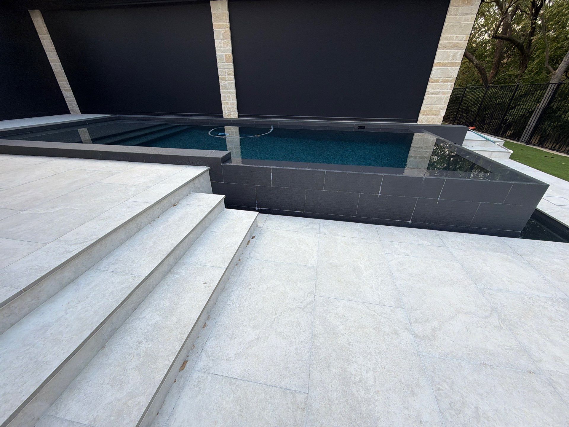 Modern Geometric Pool with Dark Interior Finish by Pinnacle Pools and Spas - DFW
