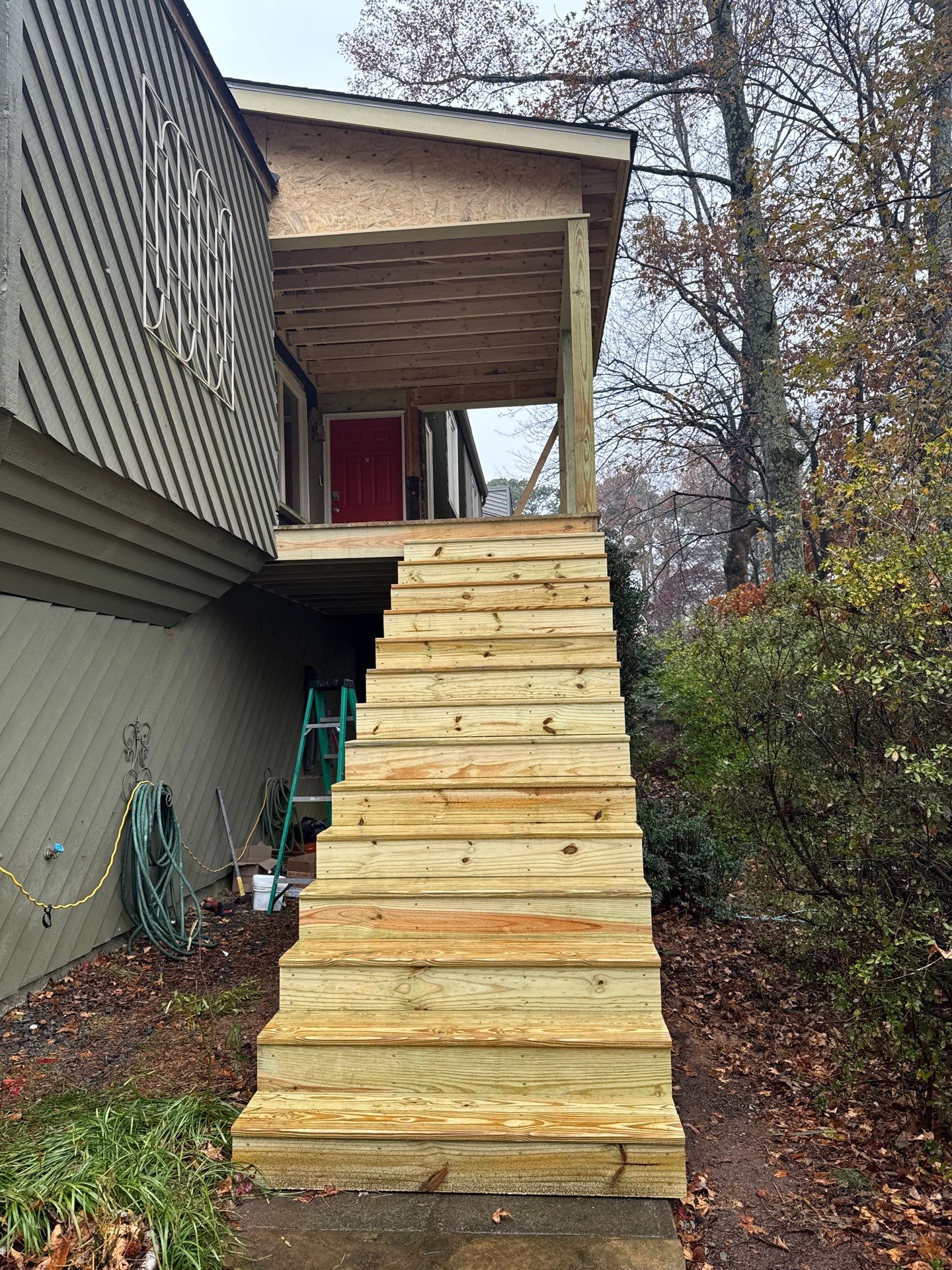 Elevated Wood Deck and Siding Replacement in Marietta by Swift Home Renovations