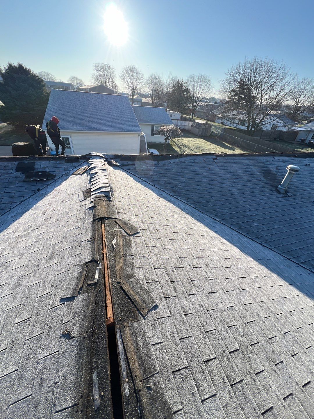 Storm Damage Residential Roof and Siding Installation by WIW Enterprises Inc