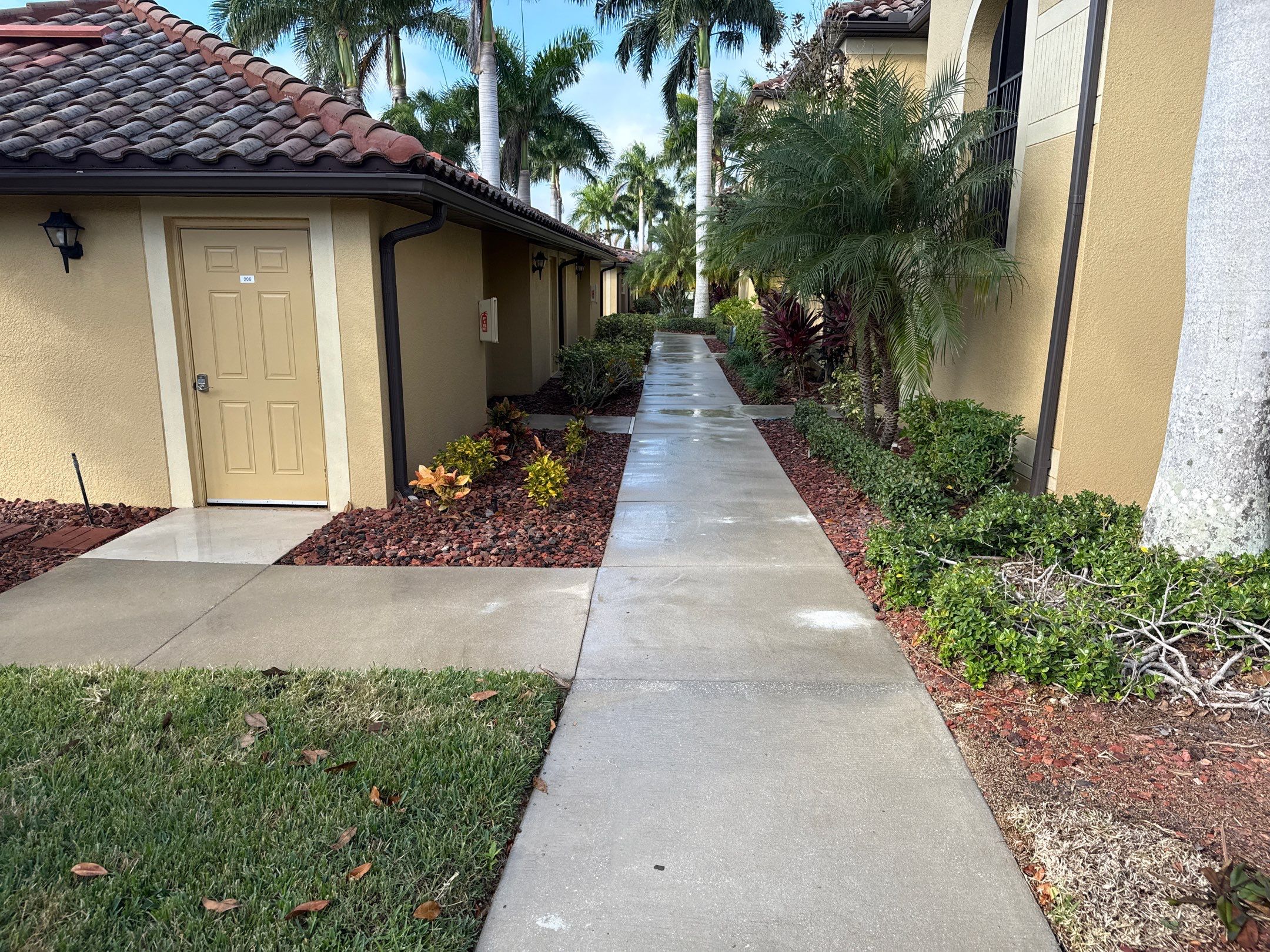 HOA Condo Concrete Driveway & Sidewalk Cleaning – River Strand Community, Bradenton, FL by Sunshine AquaWash