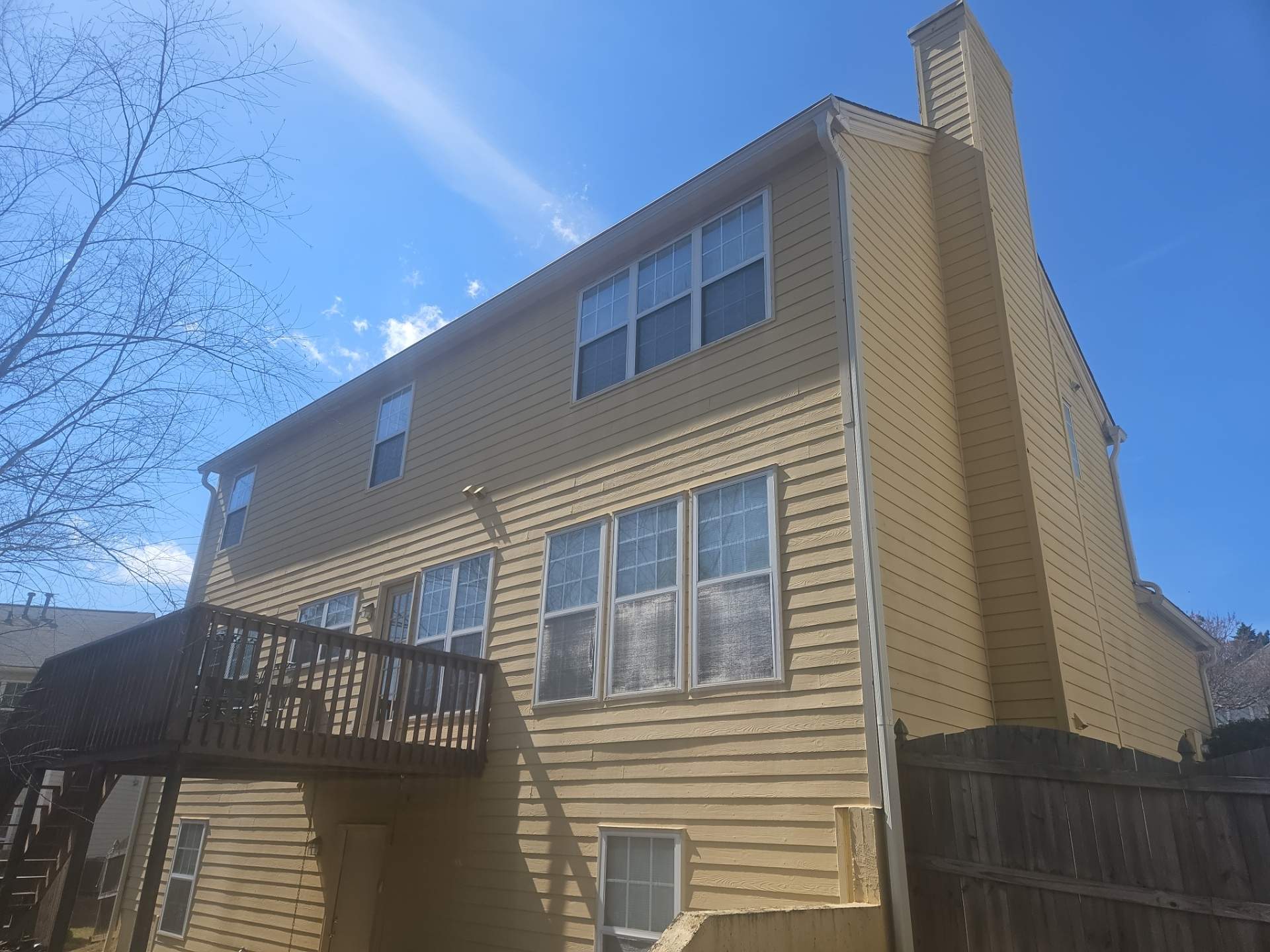 Rotten Wood Replacement Plus Stucco & Siding Painting  by Nelson Exteriors 