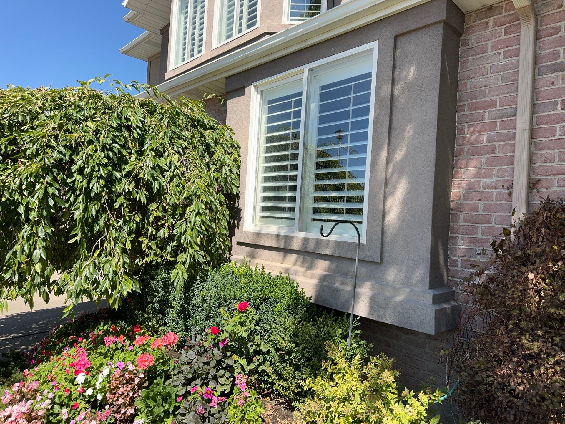 Centerville | High-End Stucco Conversion Accent | Walnut Cedar & Primed B&B by Ideal Siding Utah