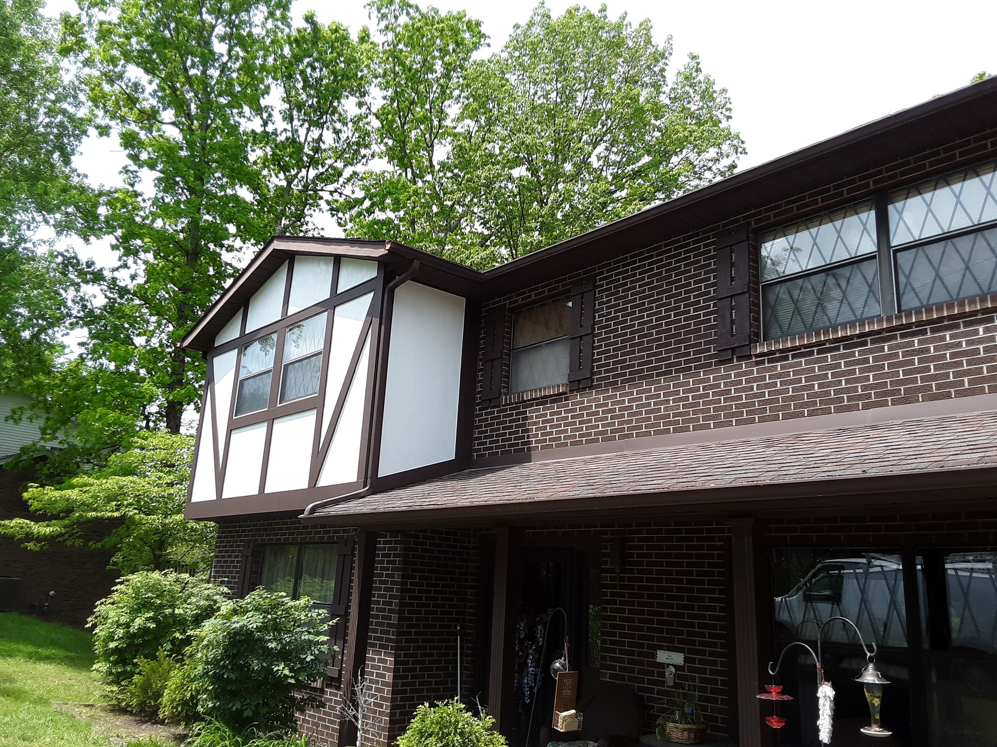Old to New Tudor Style Fiber Cement Update  by Secure Construction Company Inc