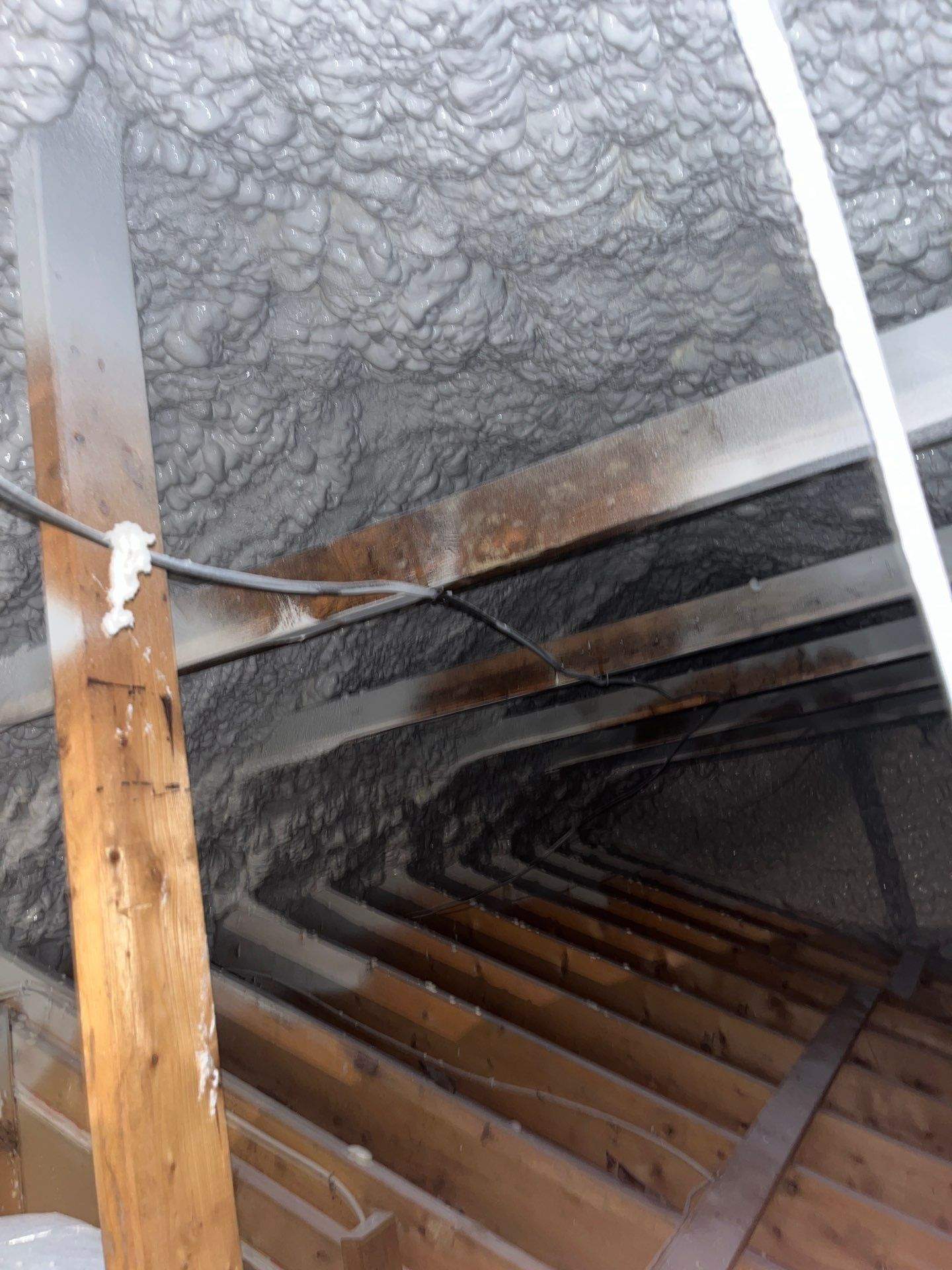 Attic Insulation using open cell spray foam by NYS Foam & Energy