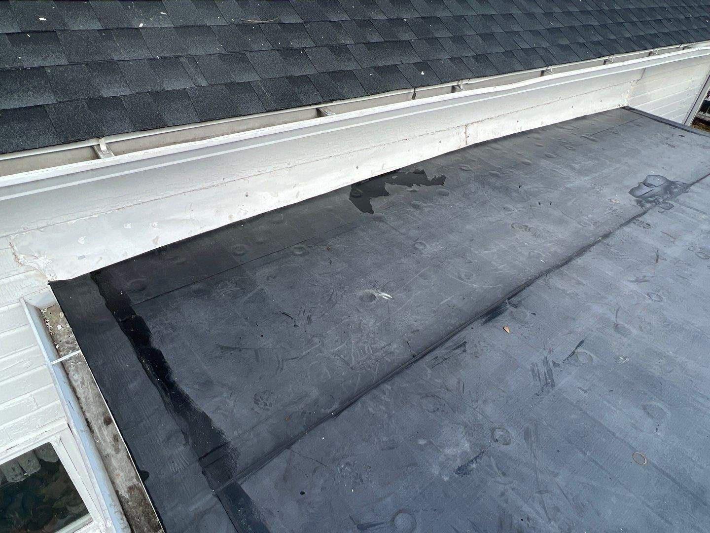 Residential Roofing Installation using 60 mil rubber roof by Nitro Roofing and Construction