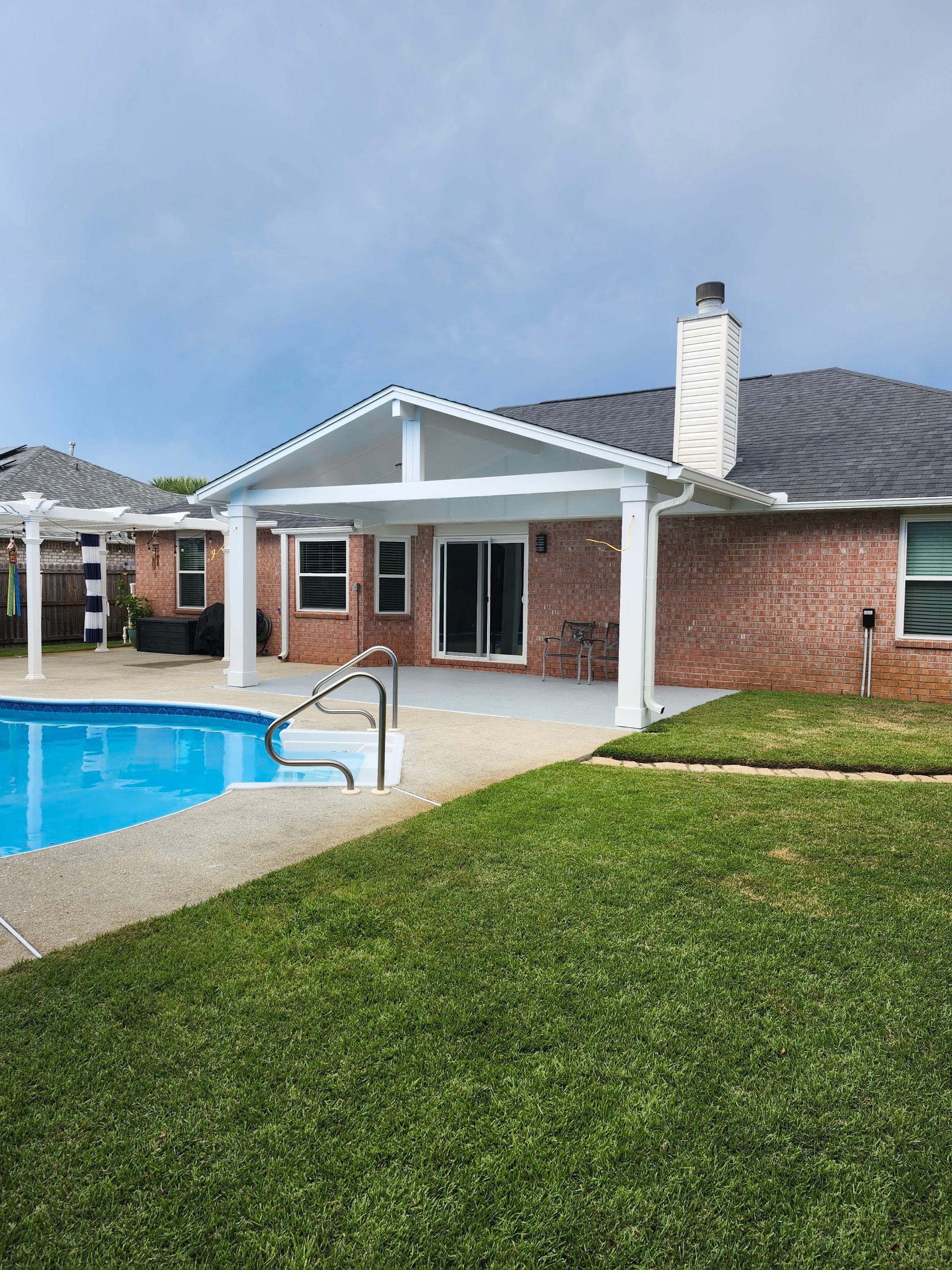 Poolside Cathedral Patio Cover by Titan Sunrooms