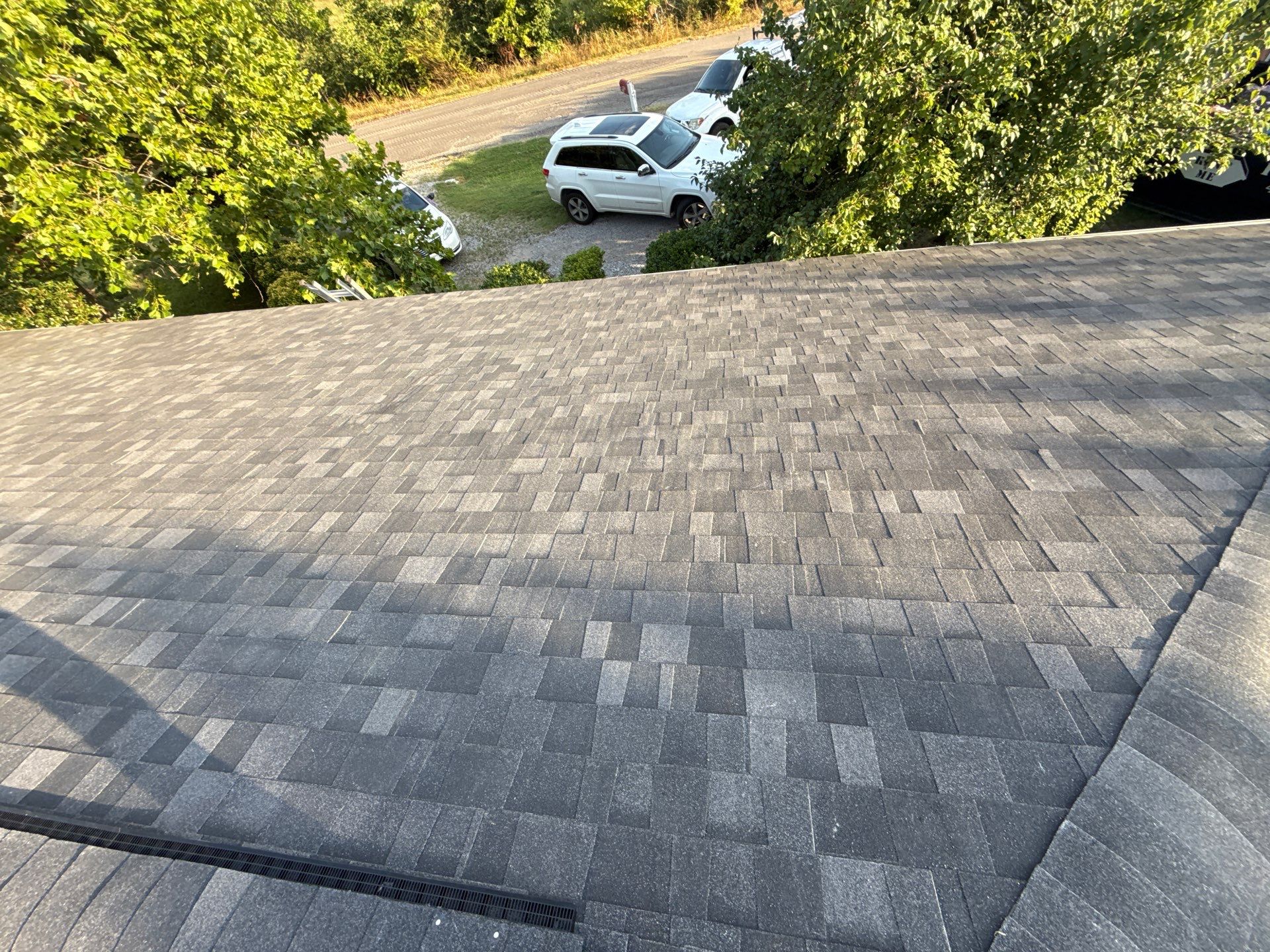 2 layers tear off & installation of new architectural shingles. by In & Out Construction & Remodeling, LLC