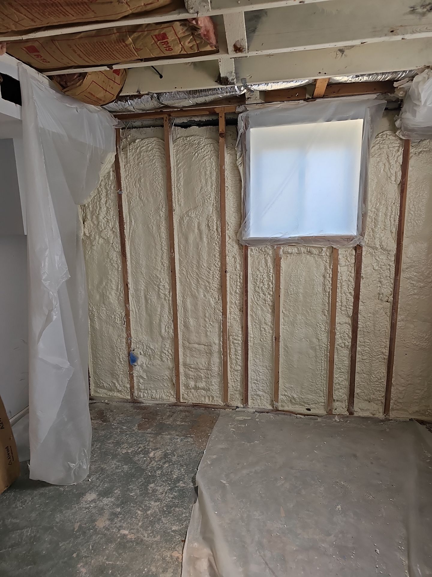 Basement Exterior Walls using Closed Cell Spray Foam by NYS Foam & Energy