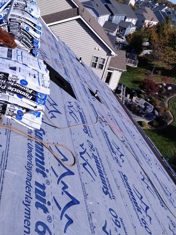 Residential Roofing Installation using Atlas Pinnacle Pristine Black Architectural Shingles by Frederick Roof Repair