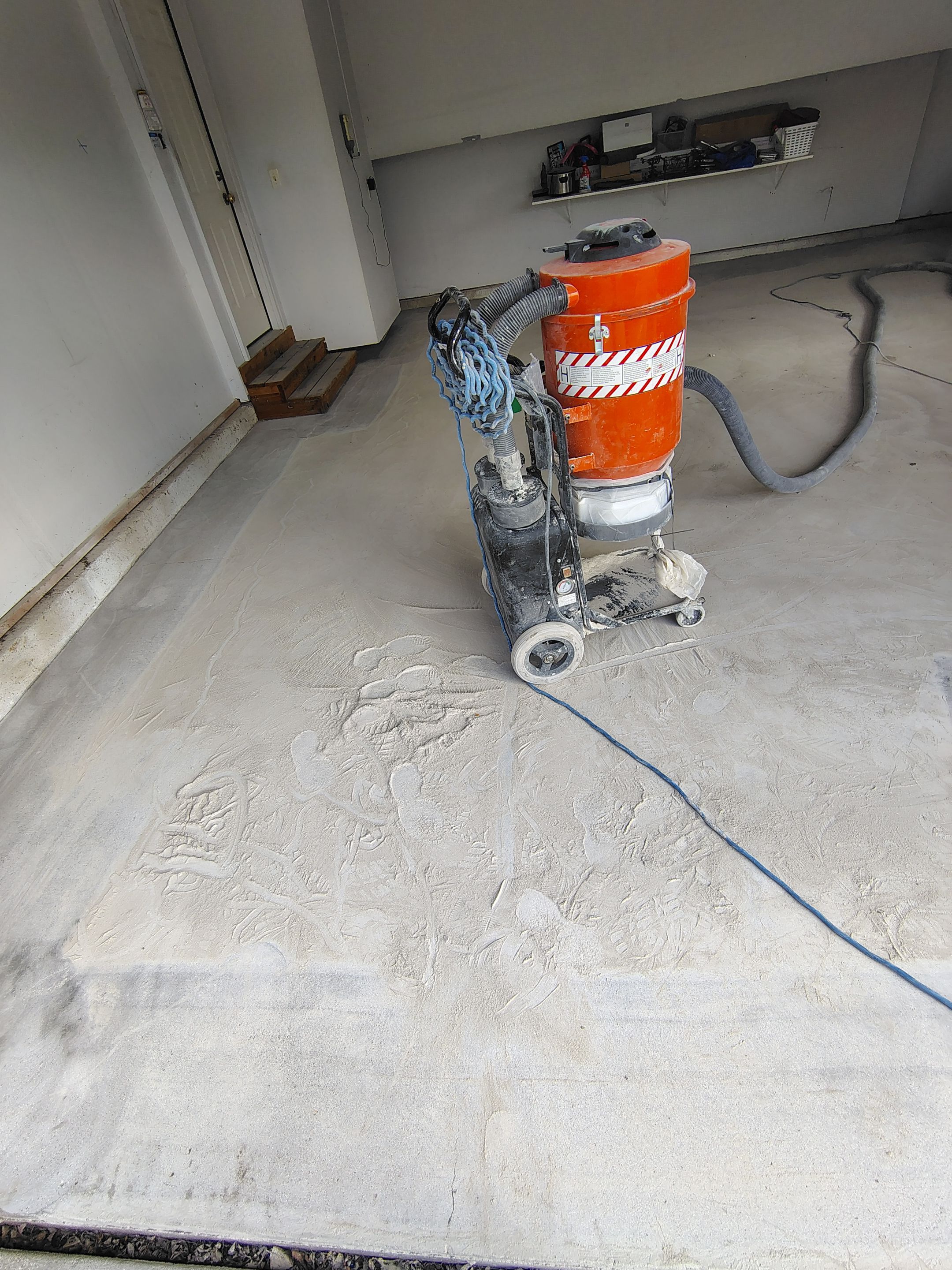 Decorative Chip Epoxy Garage Floor Coating in Sioux Falls by Select Painting, Coatings & Garage Cabinets