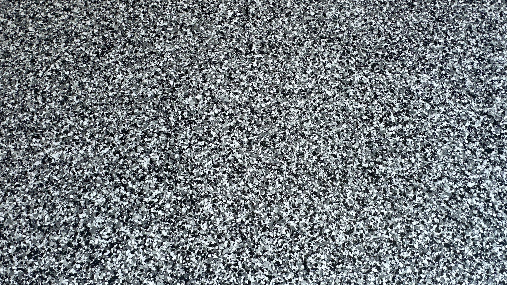 Laura B. garage transformation with a new floor and garage storage  by Banner Garage