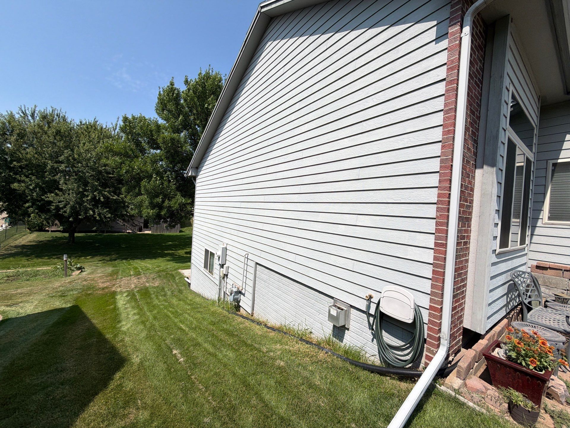 Exterior Painting for Vinyl Siding and Trim in Sioux Falls by Select Painting, Coatings & Garage Cabinets