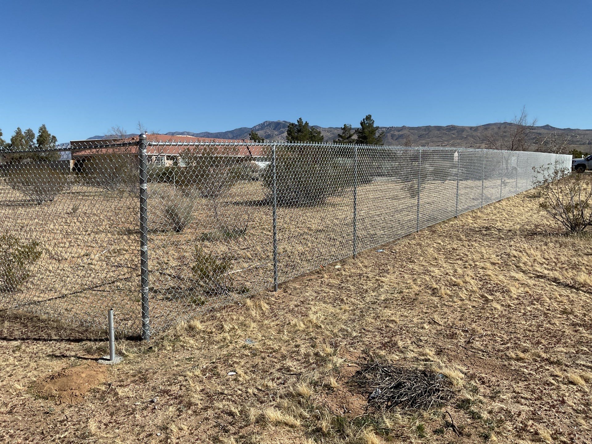 Fence Installation using chain link by Fence Guys Inc.