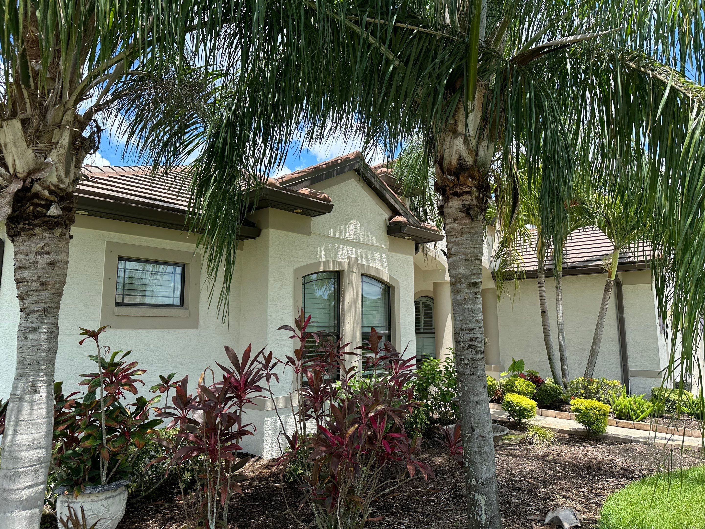 Flat Tile Roof Cleaning, House Wash & Sidewalk Cleaning in Enclave at Country Meadows, Bradenton, FL | Sunshine AquaWash by Sunshine AquaWash