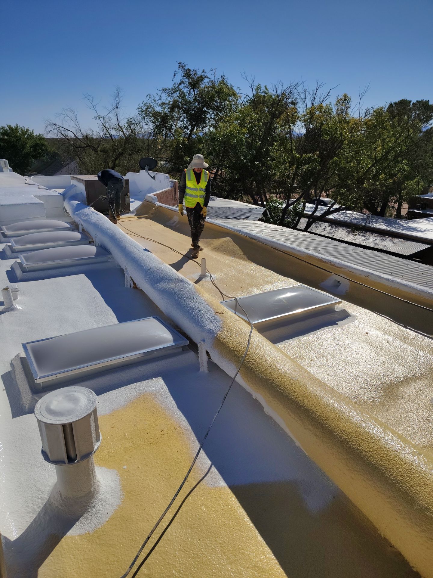 Residential roof application by SPF Services 