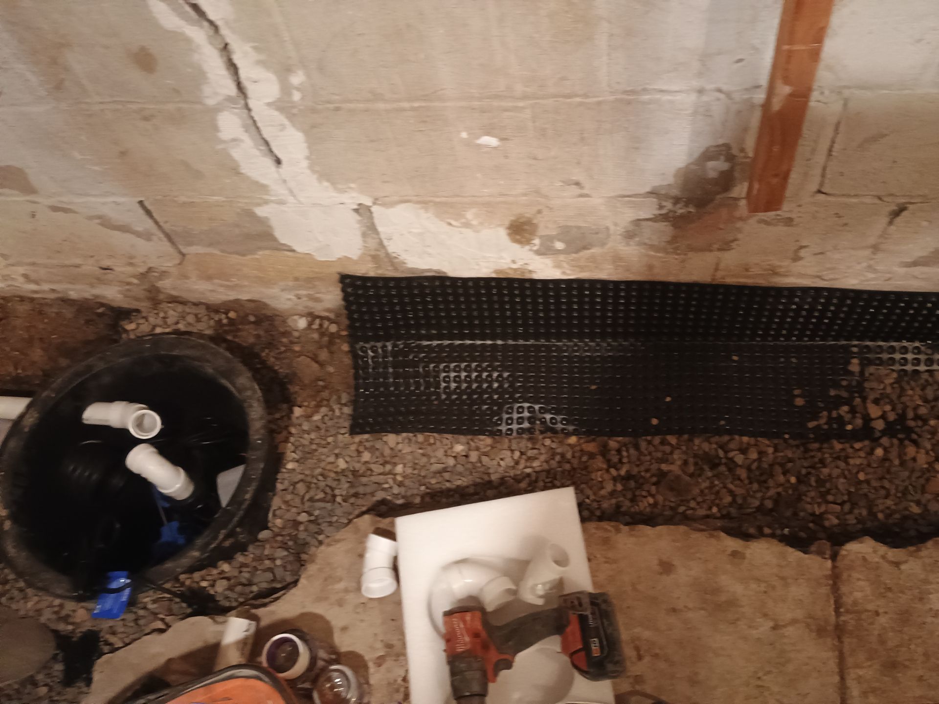 Drain Tile in Minneapolis for Kristen & Taylor by Waterproofing Northeast