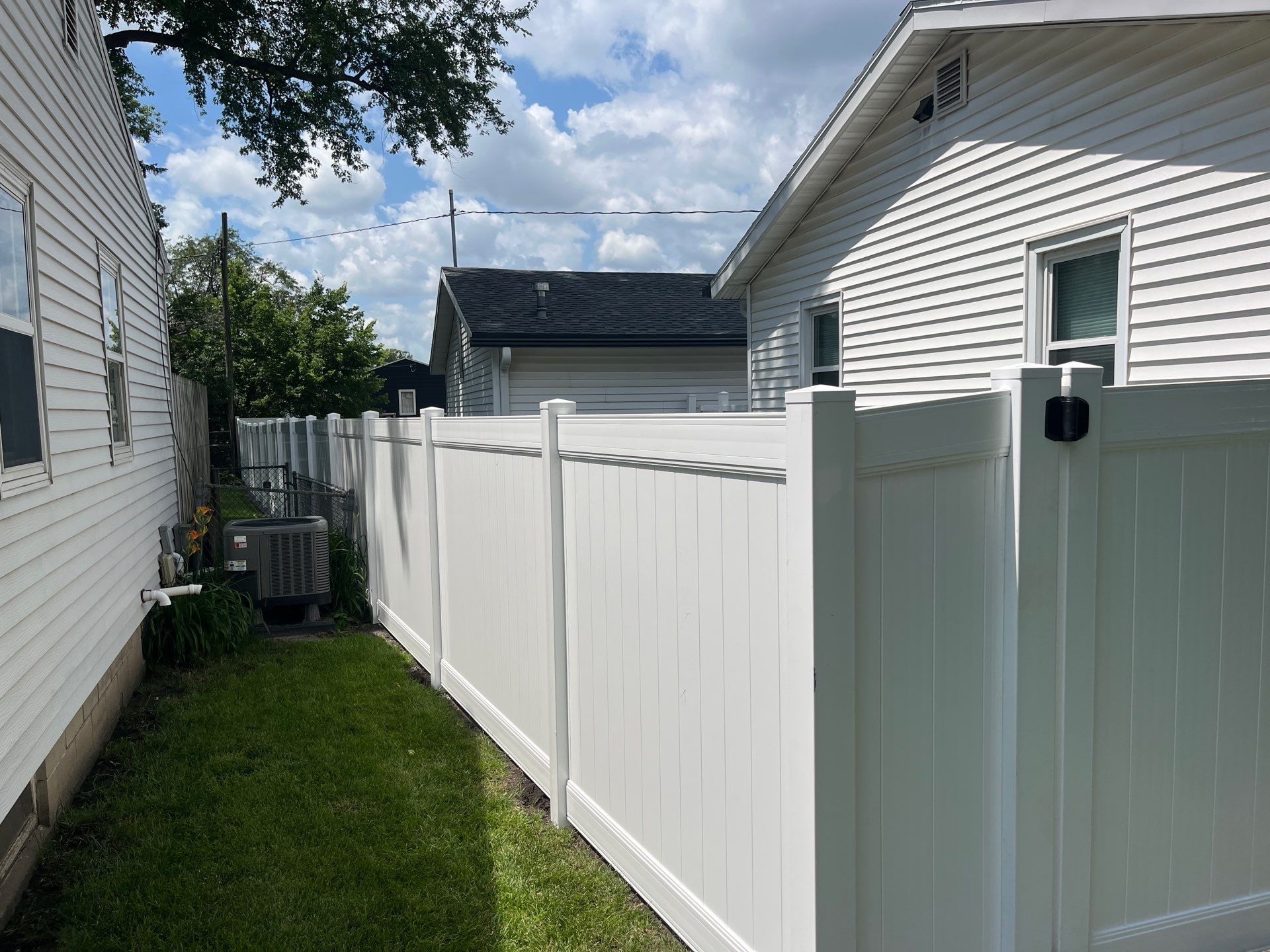 White Vinyl Privacy and Picket Fence Installation in Waterloo by Perfect Picket Fence and Stain