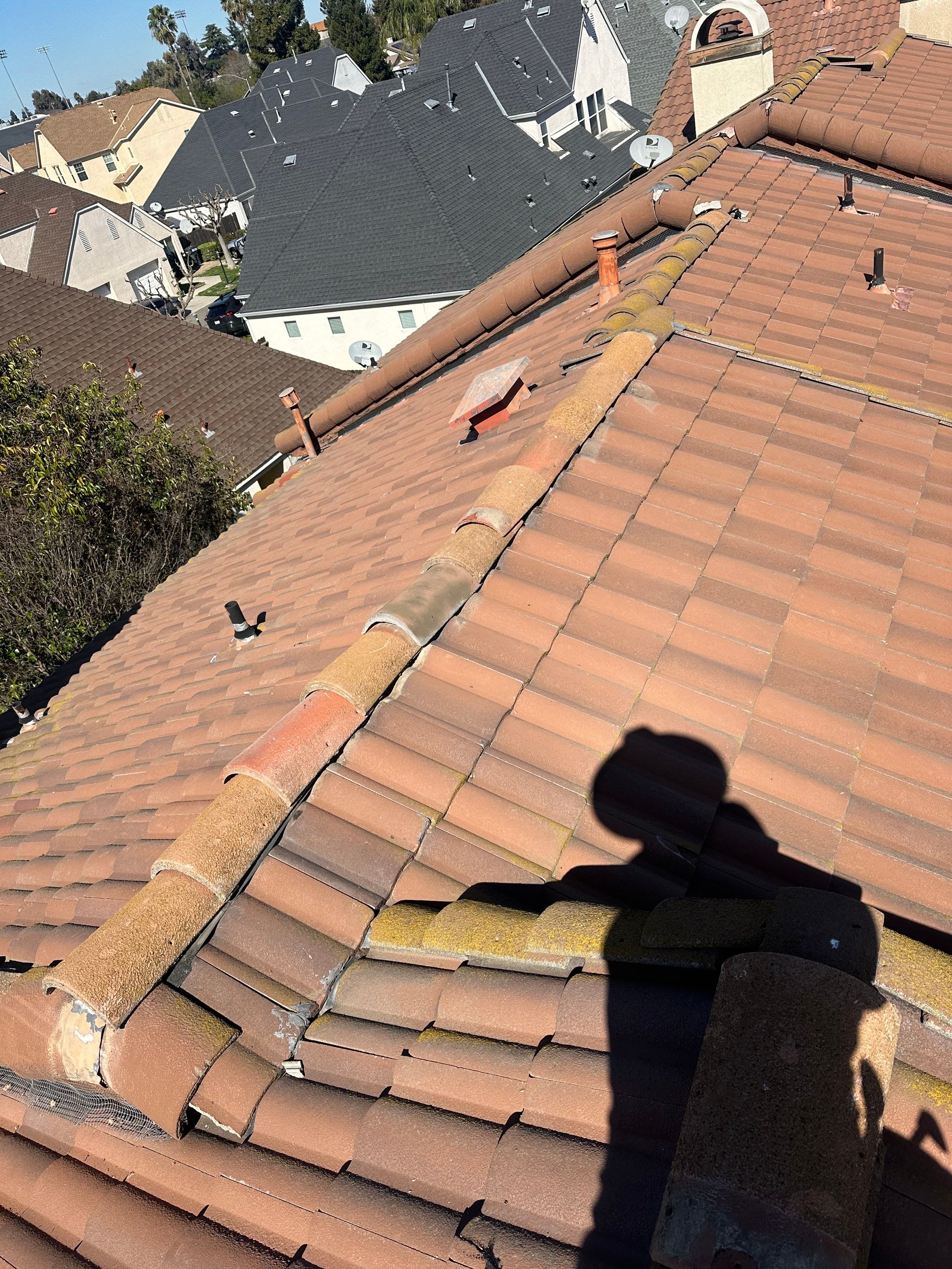 Tile Roof repair by Grandmark Service Company