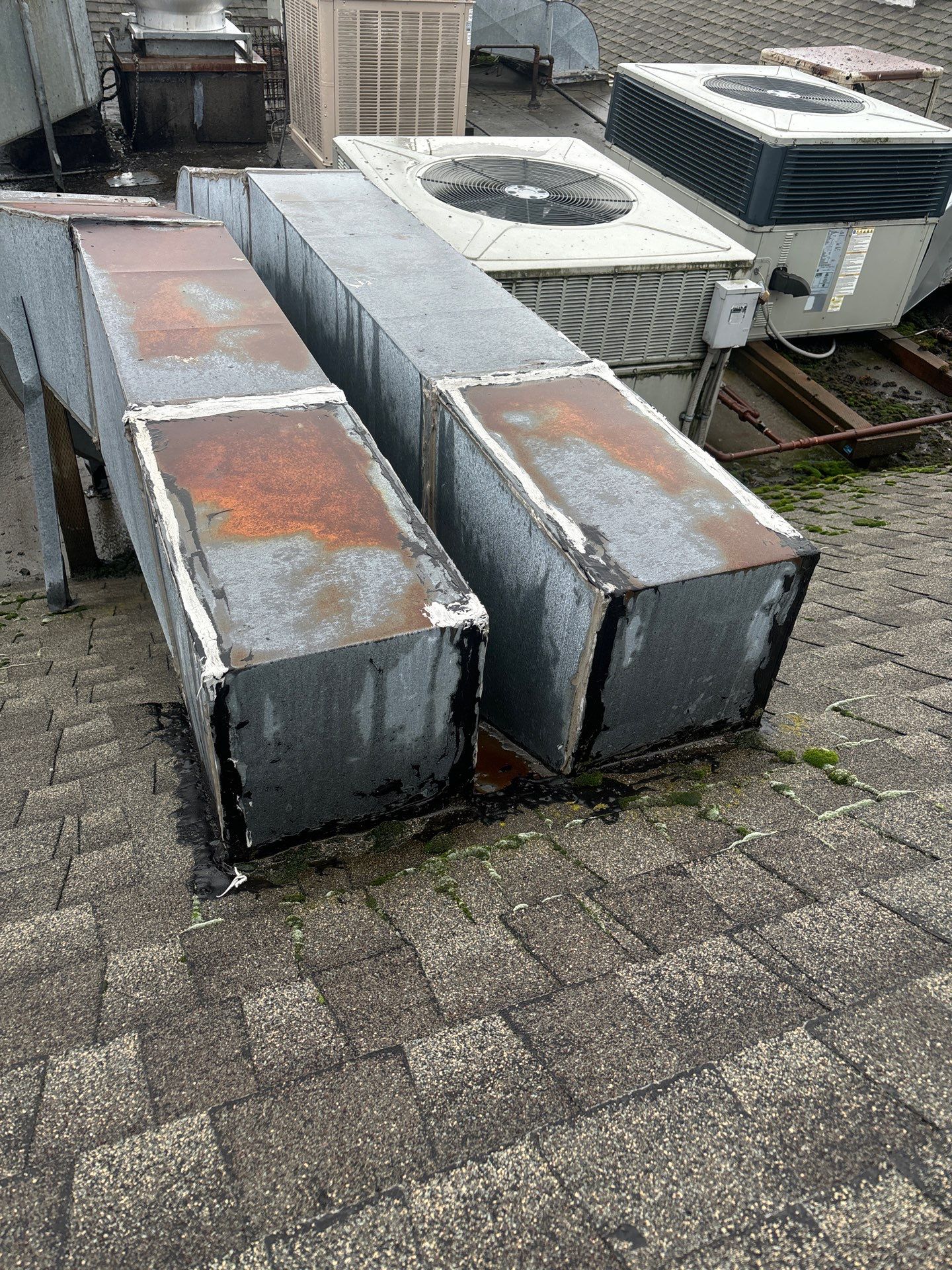 Summit Grey Lum Yun Salem Oregon Commercial Roof by Orezona Building & Roofing Company, Inc.