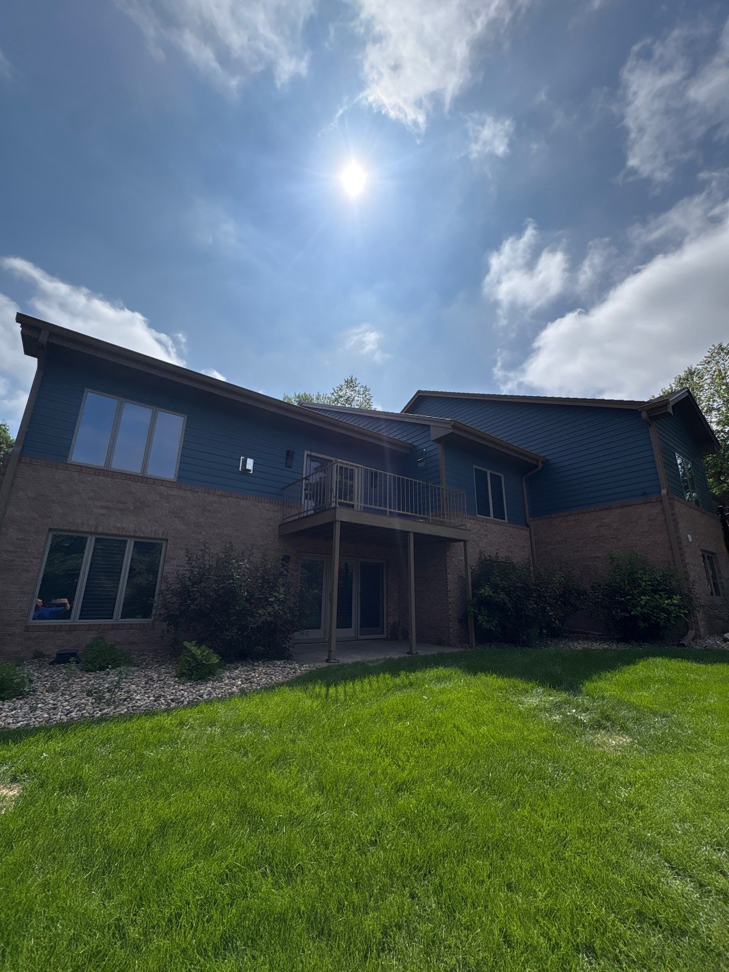 Residential Exterior Painting and Siding Refresh in Sioux Falls by Select Painting, Coatings & Garage Cabinets