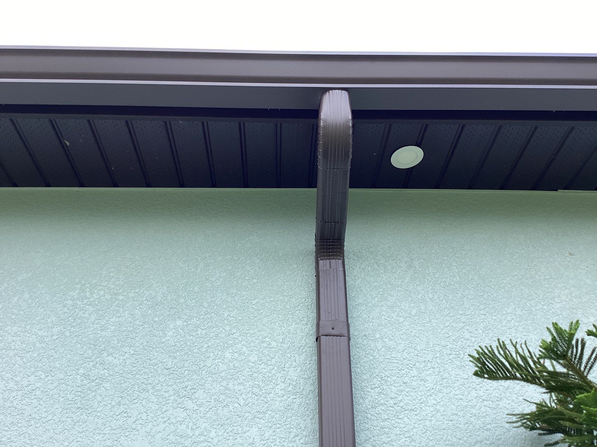 Musket Brown and New Downspouts in Lehigh Acres, FL  by Gutter Professors