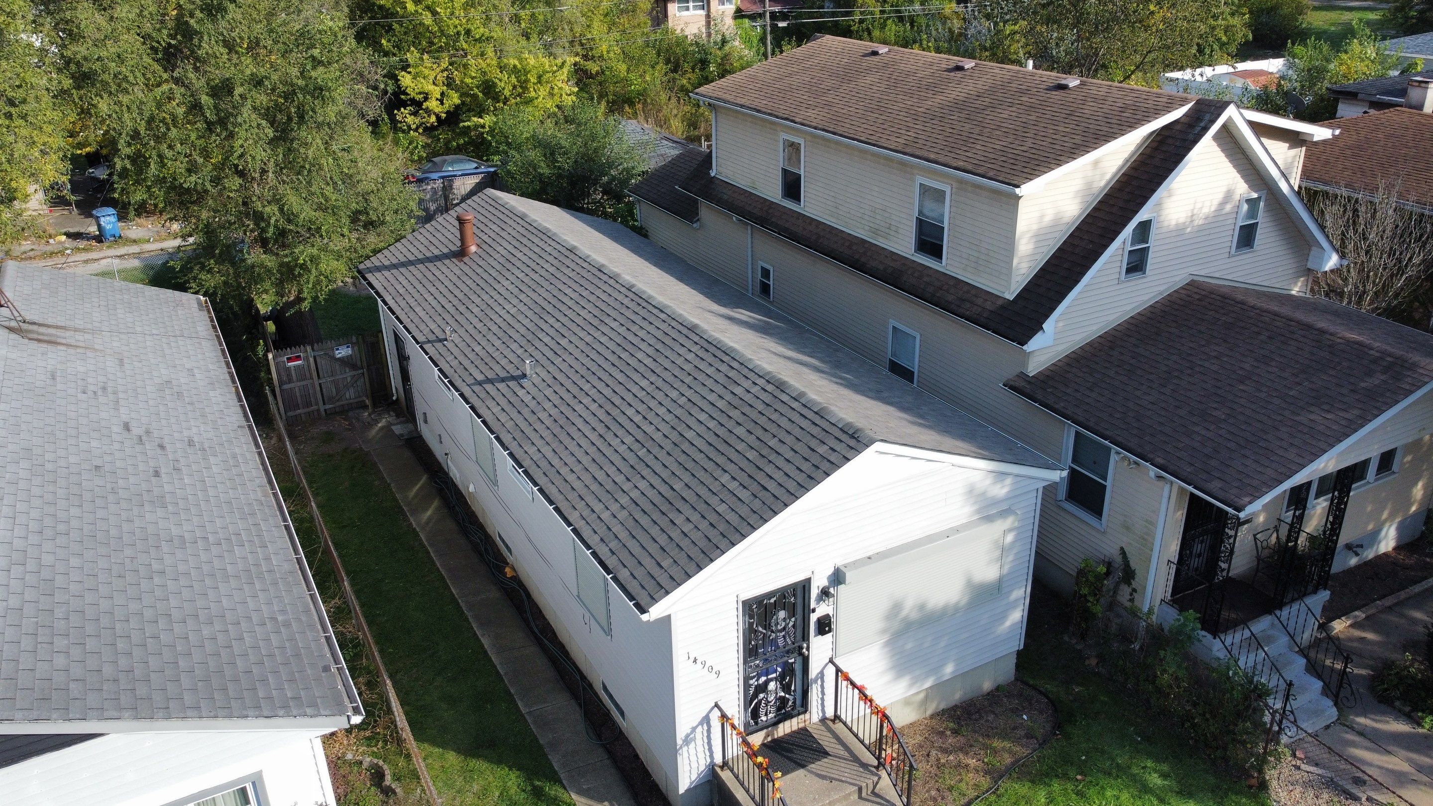 Two Roof Replacements  by HighRise Exteriors
