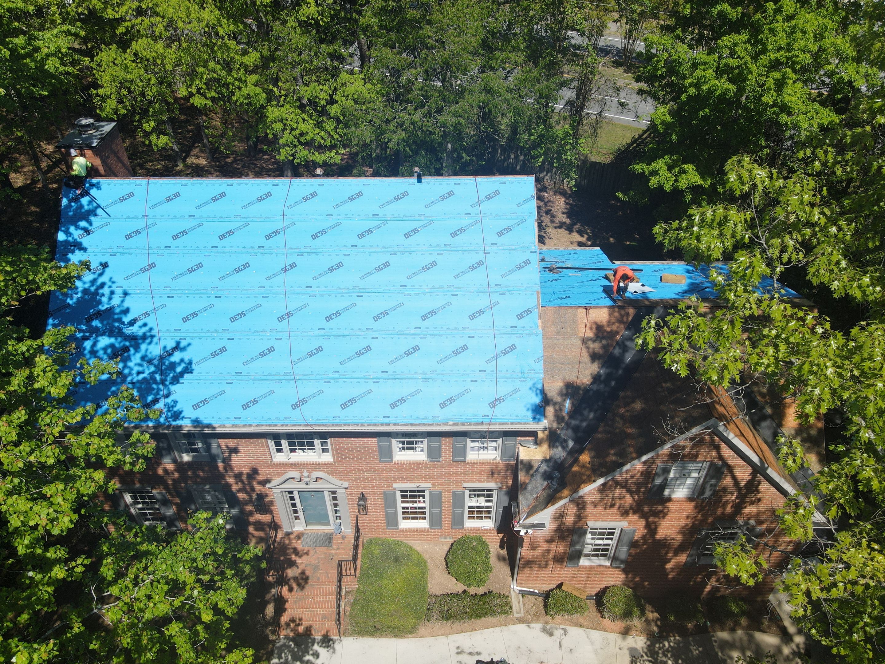 Residential Roofing Installation using Owens Corning Quary Gray by Inspector Roofing and Restoration