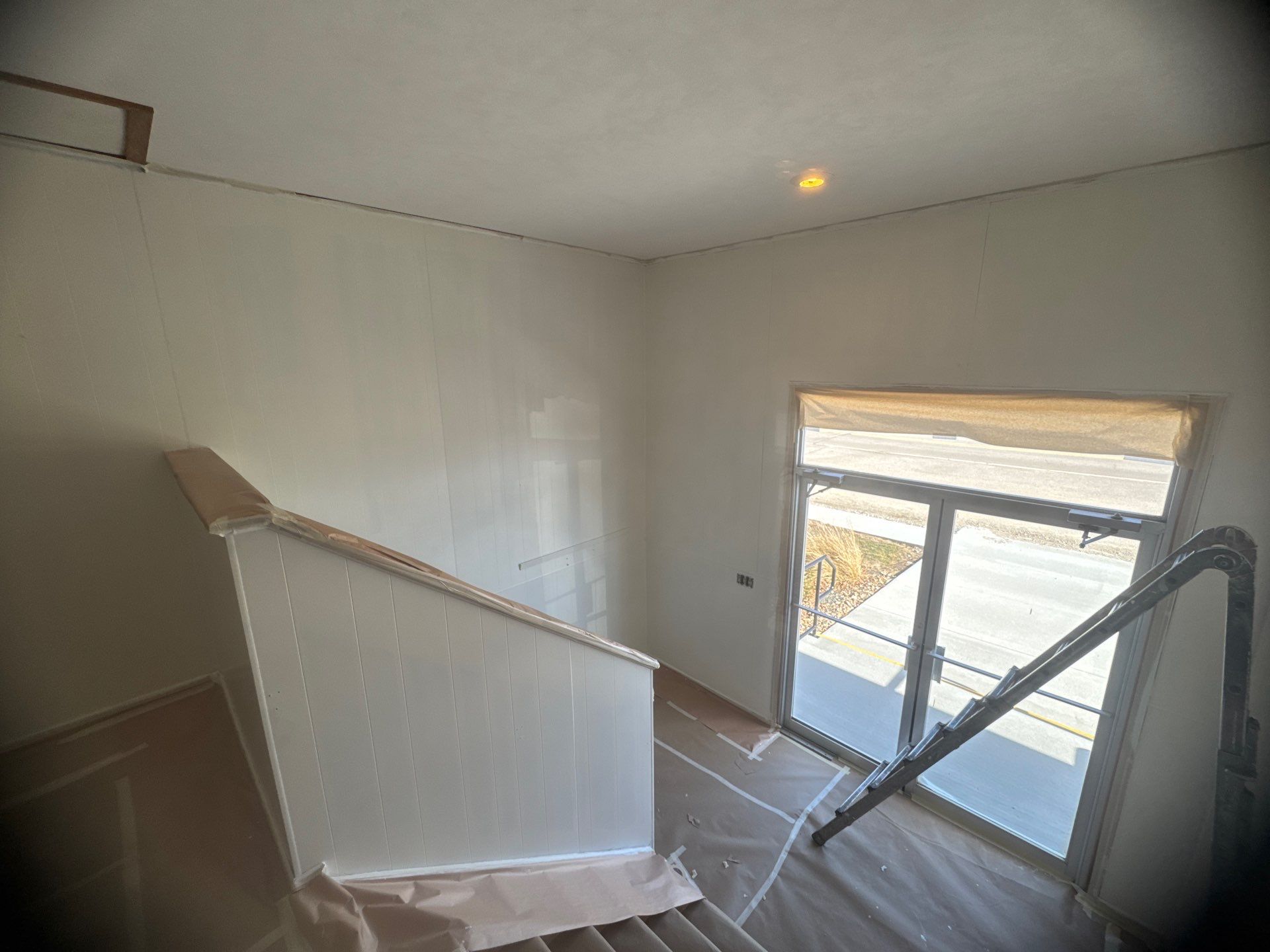Interior Stairwell Transformation – Before & After by Midwest Paint LLC