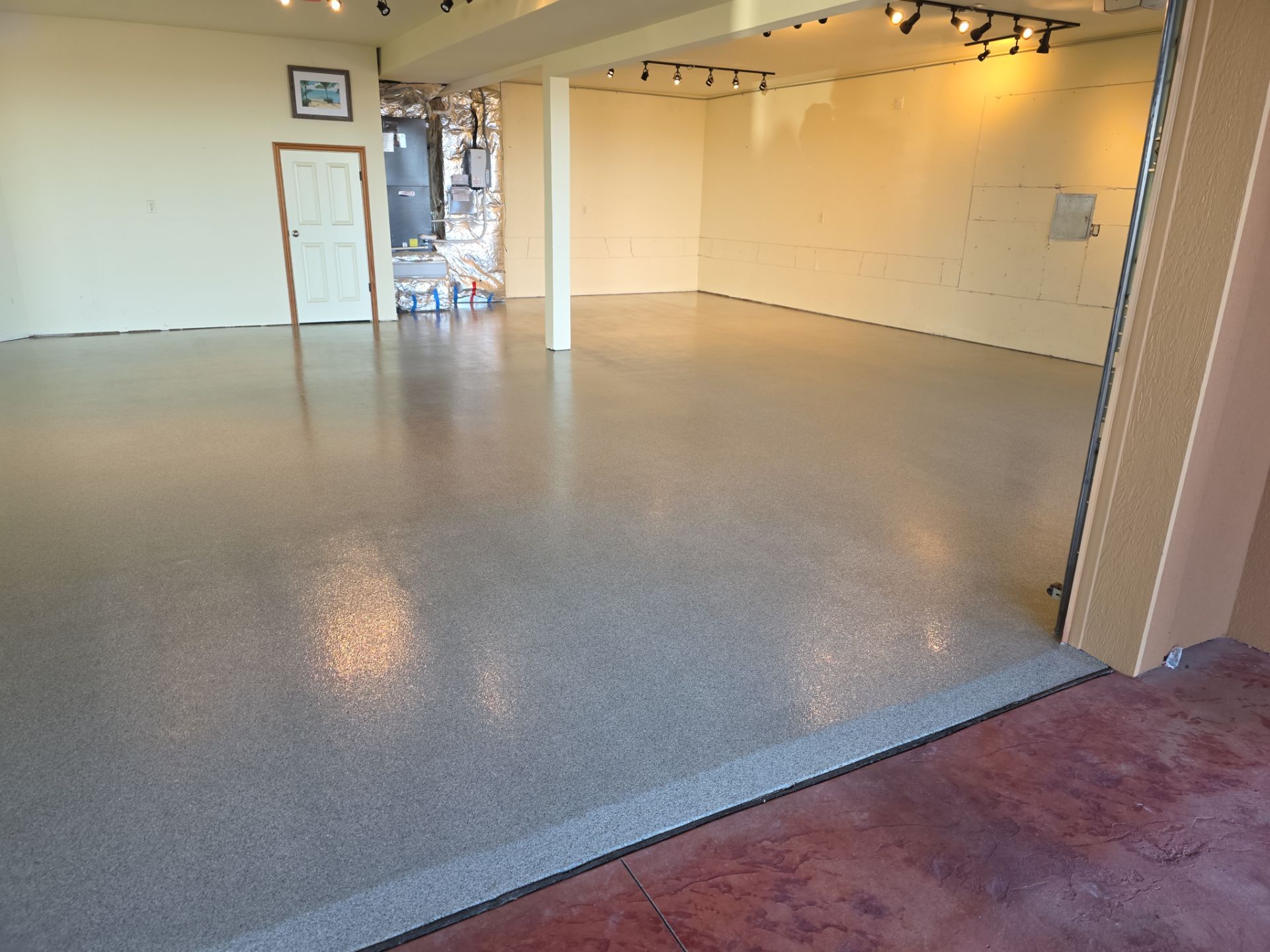 Garage Transformation using Stone/Marble Hybrid by Croc Coatings, LLC