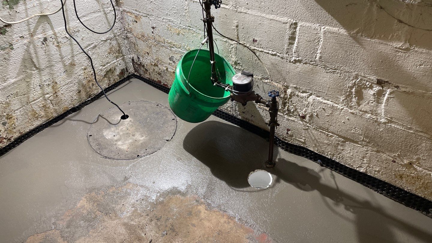 Interior Drain Tile & Sump Pump System in North Minneapolis by Waterproofing Northeast