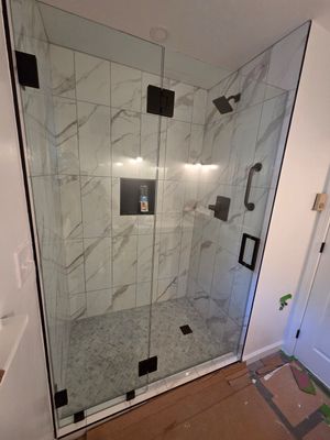 Two Showers using Tempered Shower Glass