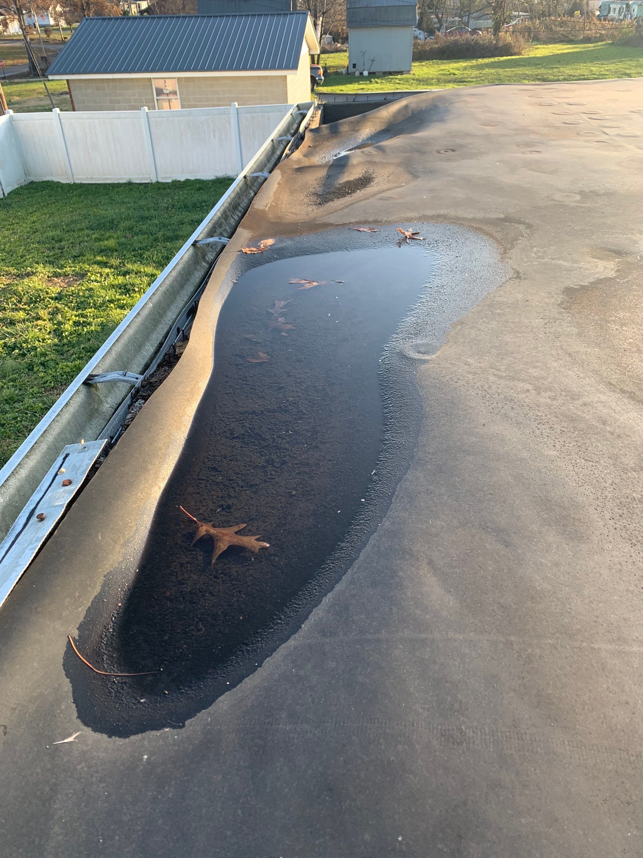 Rubber Roofing  on a residential sunroom by Secure Construction Company Inc
