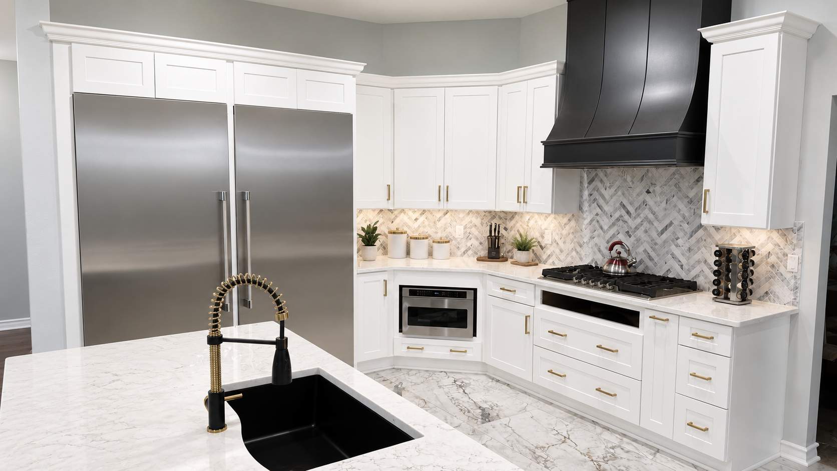 Luxury White Kitchen Remodel in The Dominion Featuring Custom Cabinetry and Marble Finishes by Legacy Bath and Kitchen
