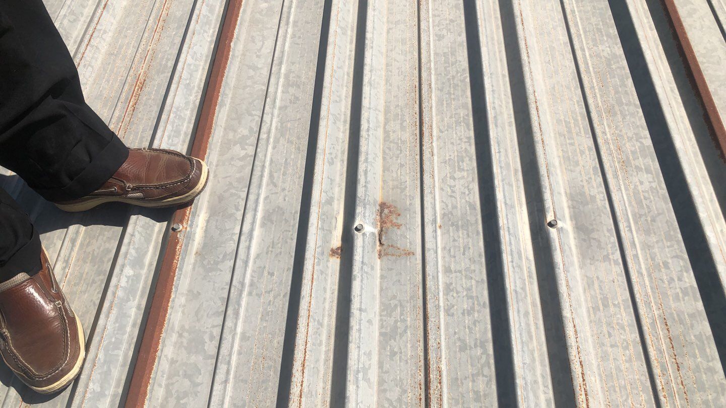 Metal Restoration Roofing system with Benchmark/PUMA XL 20 yr warranty by Straight Edge Roofing Inc