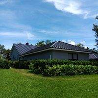 24ga 1.5" Mechanical Seam Dark Bronze by Total Roofing System The Metal Roof Experts