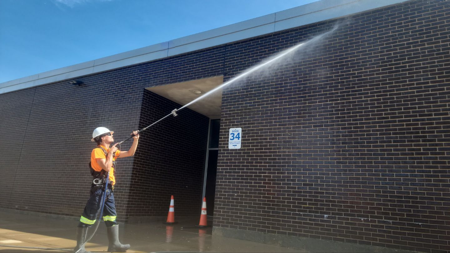 commercial pressure washing using Algaecide, soft wash soap by Northern Power Washing LLC.