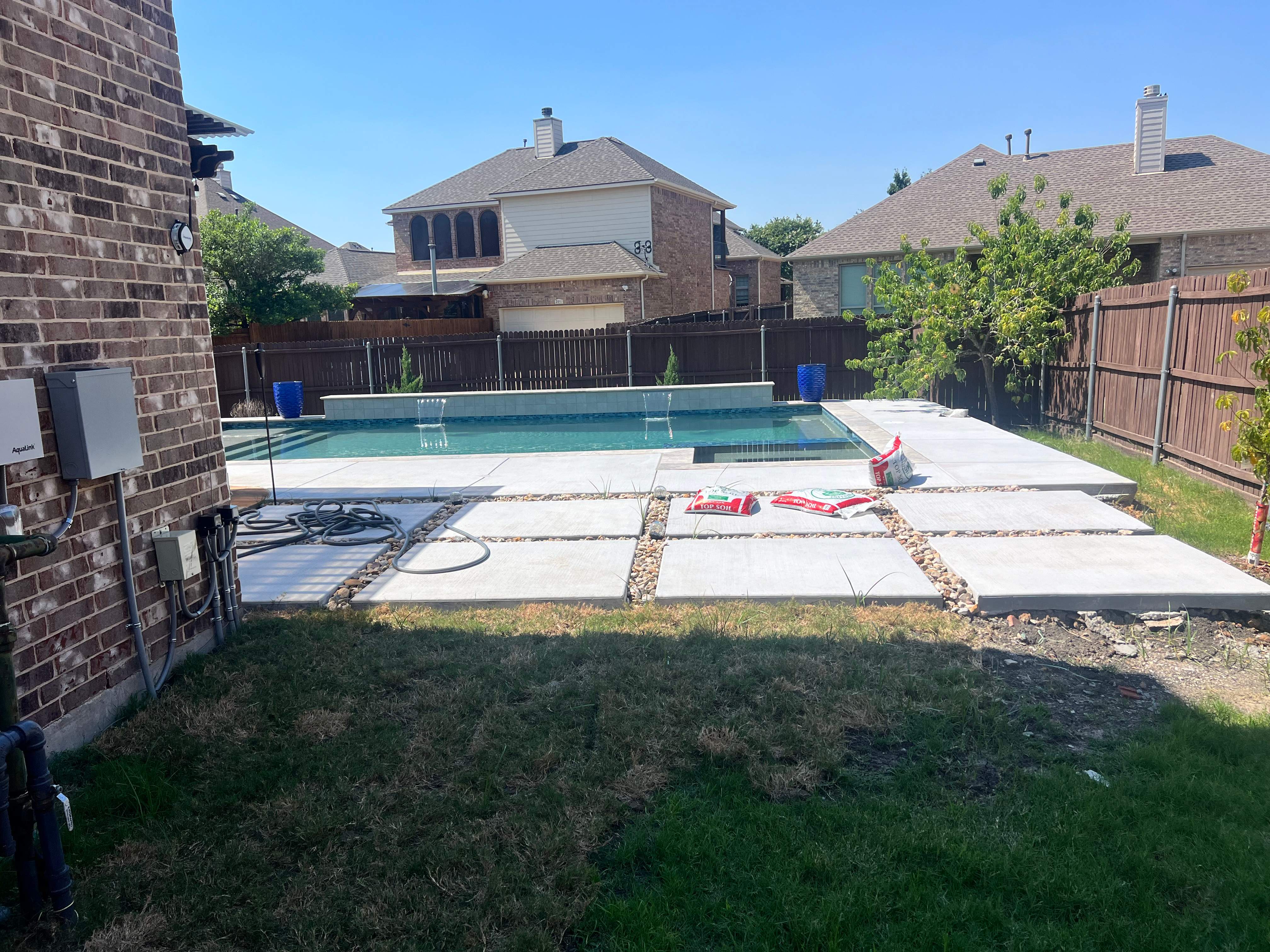 Geometric Pool with Raised Spa by Pinnacle Pools and Spas - DFW