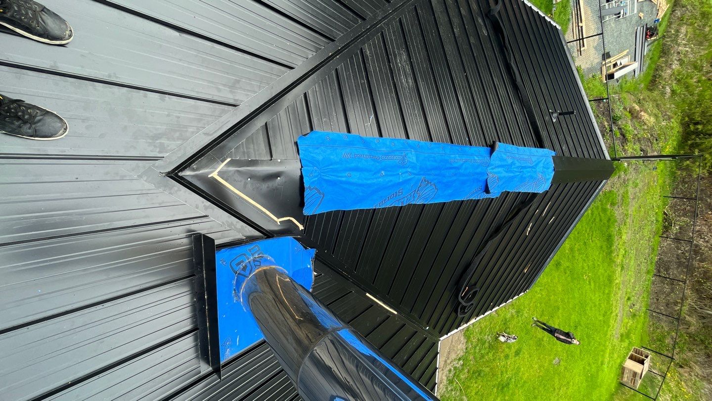 Residential ReRoofing Installation using 12" Prolok metal by Top Notch Roofing Inc