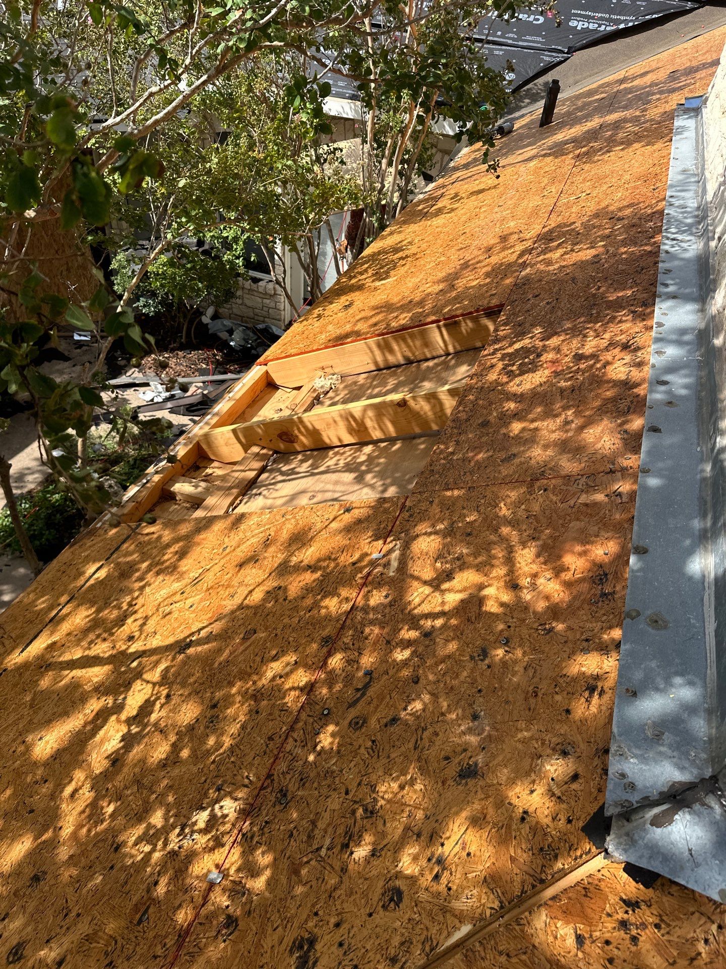 Residential Roofing Installation using IKO Nordic Granite Black by DeZign Roofing & Exteriors