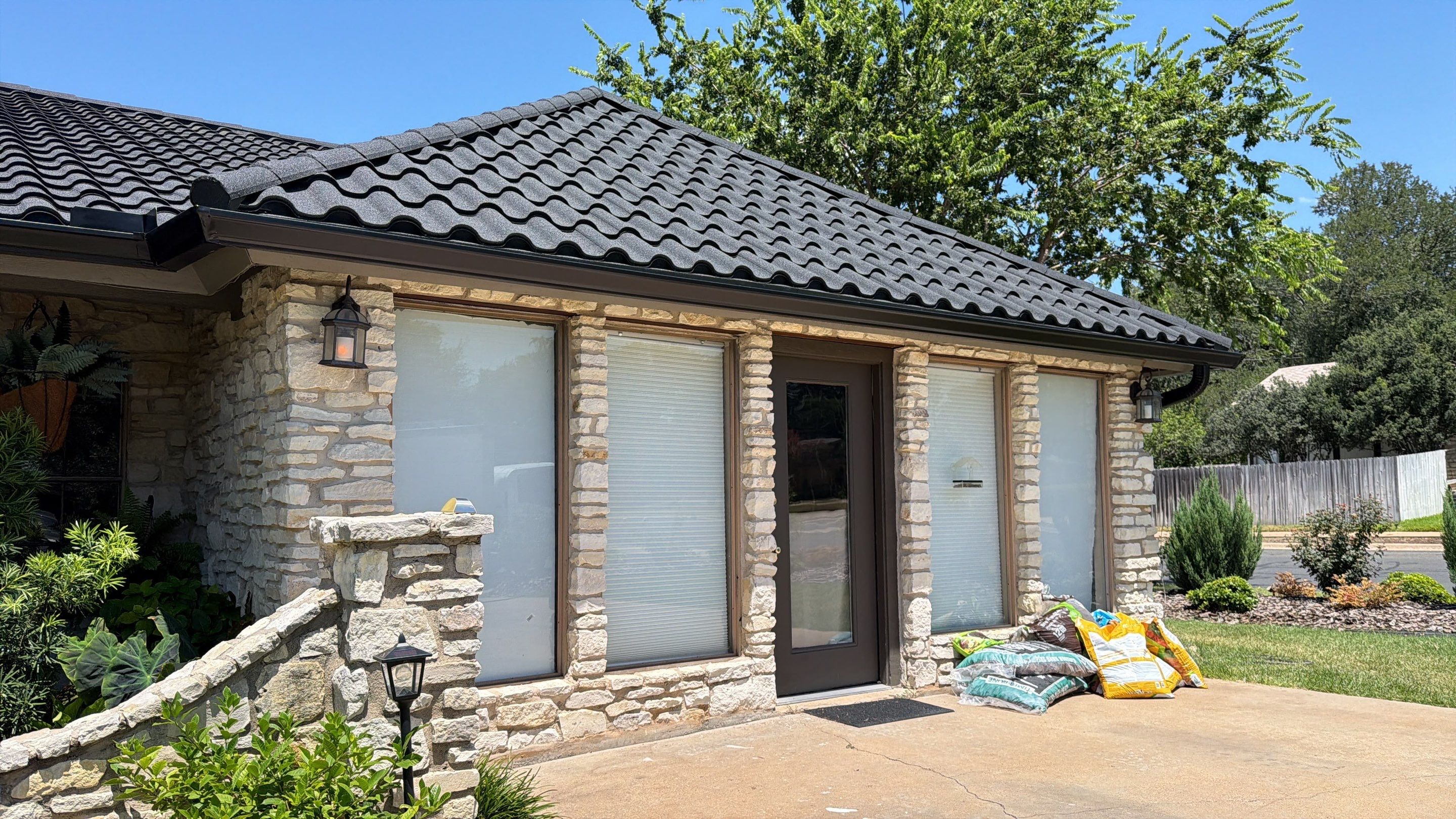 Residential Roof Replacement using Decra Villa Tile by Action Exteriors Austin