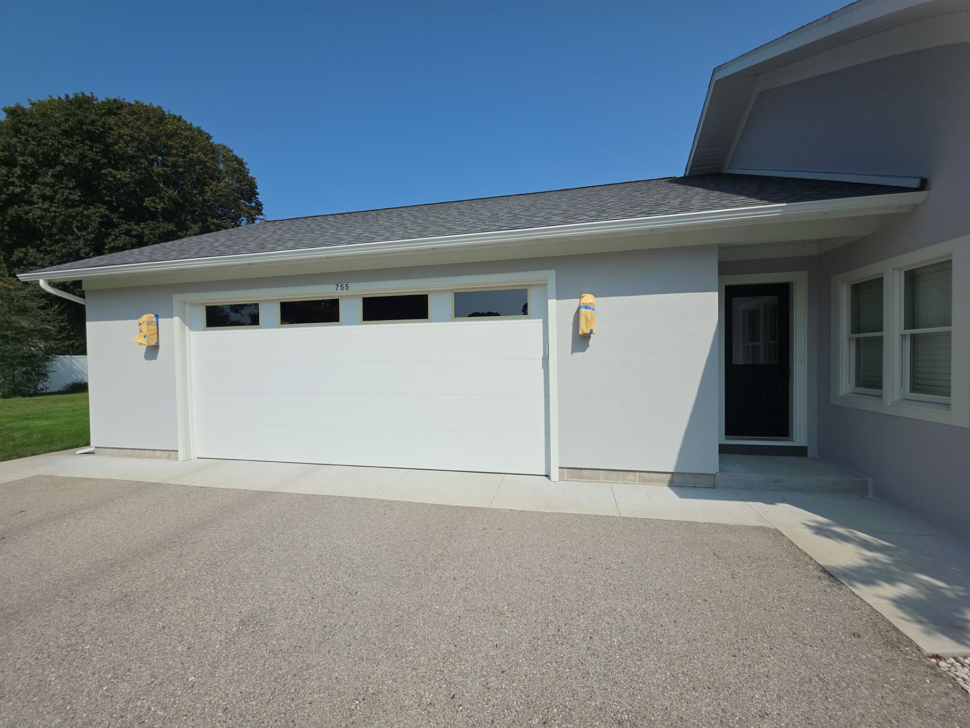 Norton Shores Residential Stucco Repair and Exterior Painting Refresh by Gordon Painting