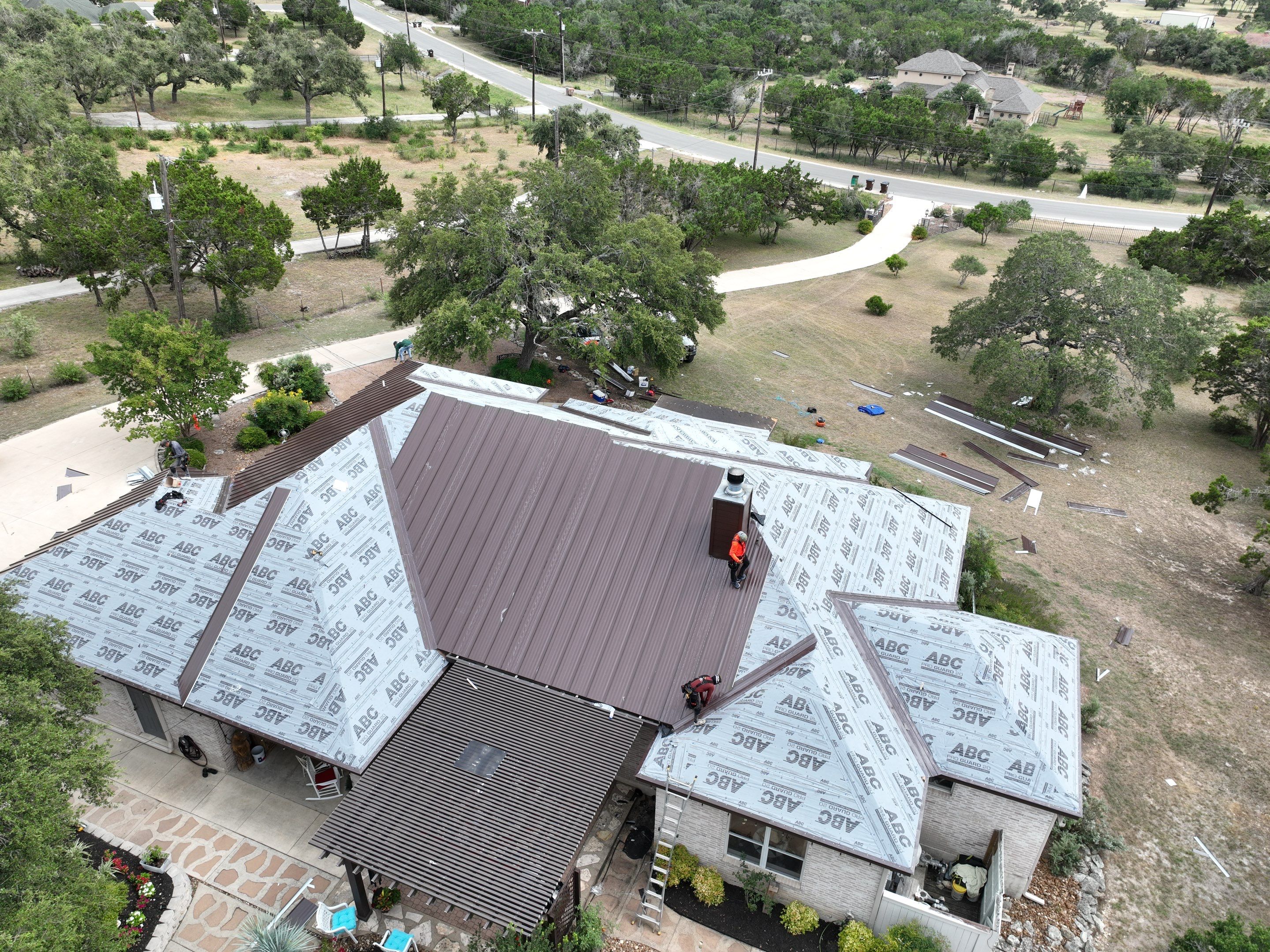 Residential Metal Roof Installation using McElroy Metal by Premier Roofing and Contracting