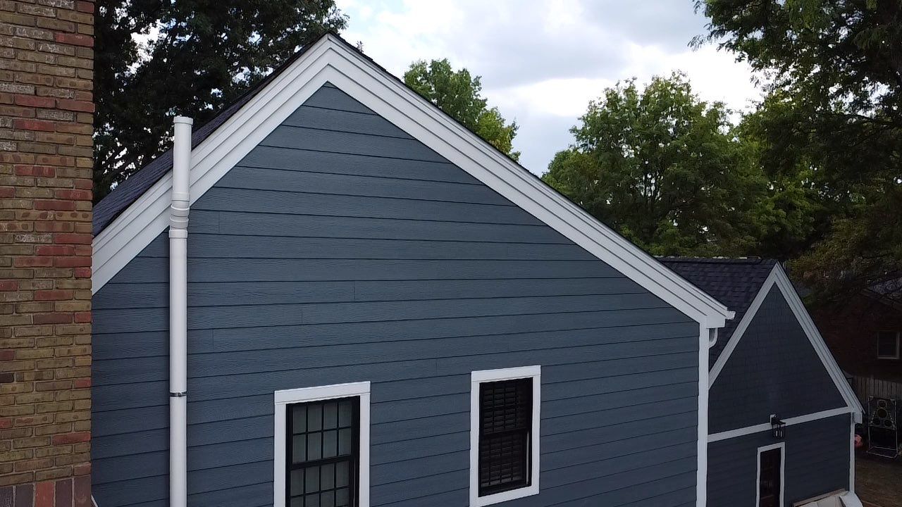 Residential Roofing Installation using James Hardie Fiber Cement Lap Siding and Certainteed Landmark Pro Shingles by Best Exteriors Inc