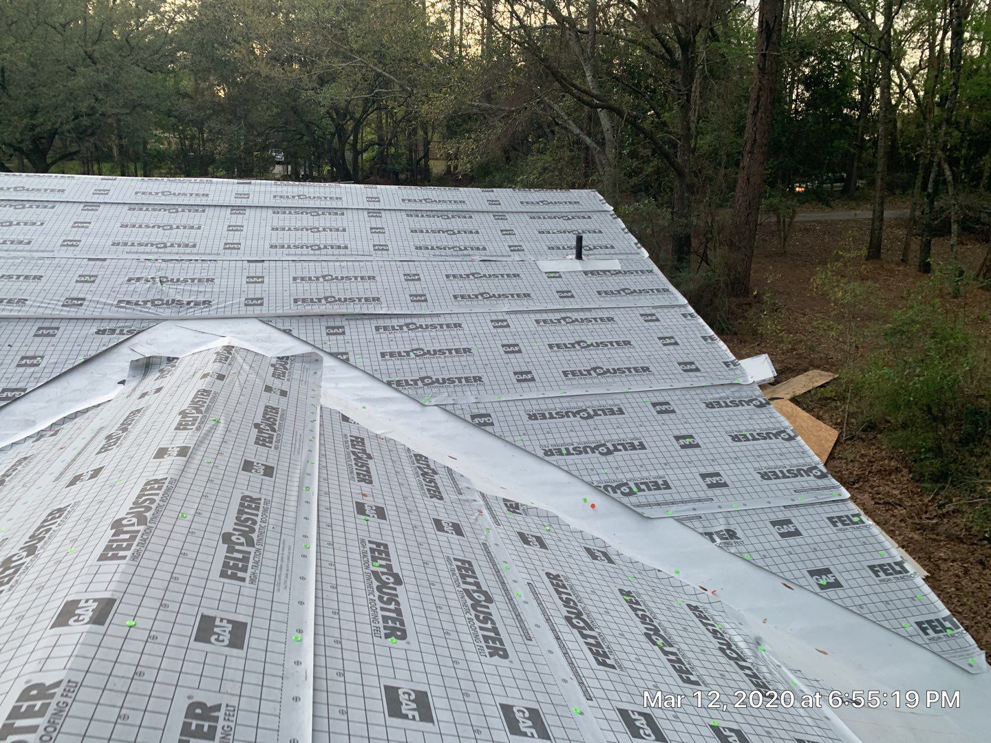 Residential Roofing Installation using Roof Replacement by American Roofing & Construction LLC