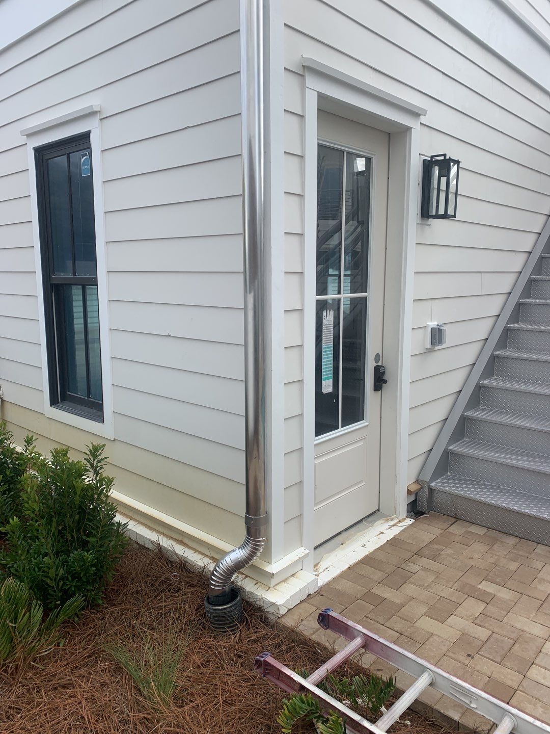 Half-Round Gutters in Galvalume Color in Santa Rosa Beach FL by Gutter Professors