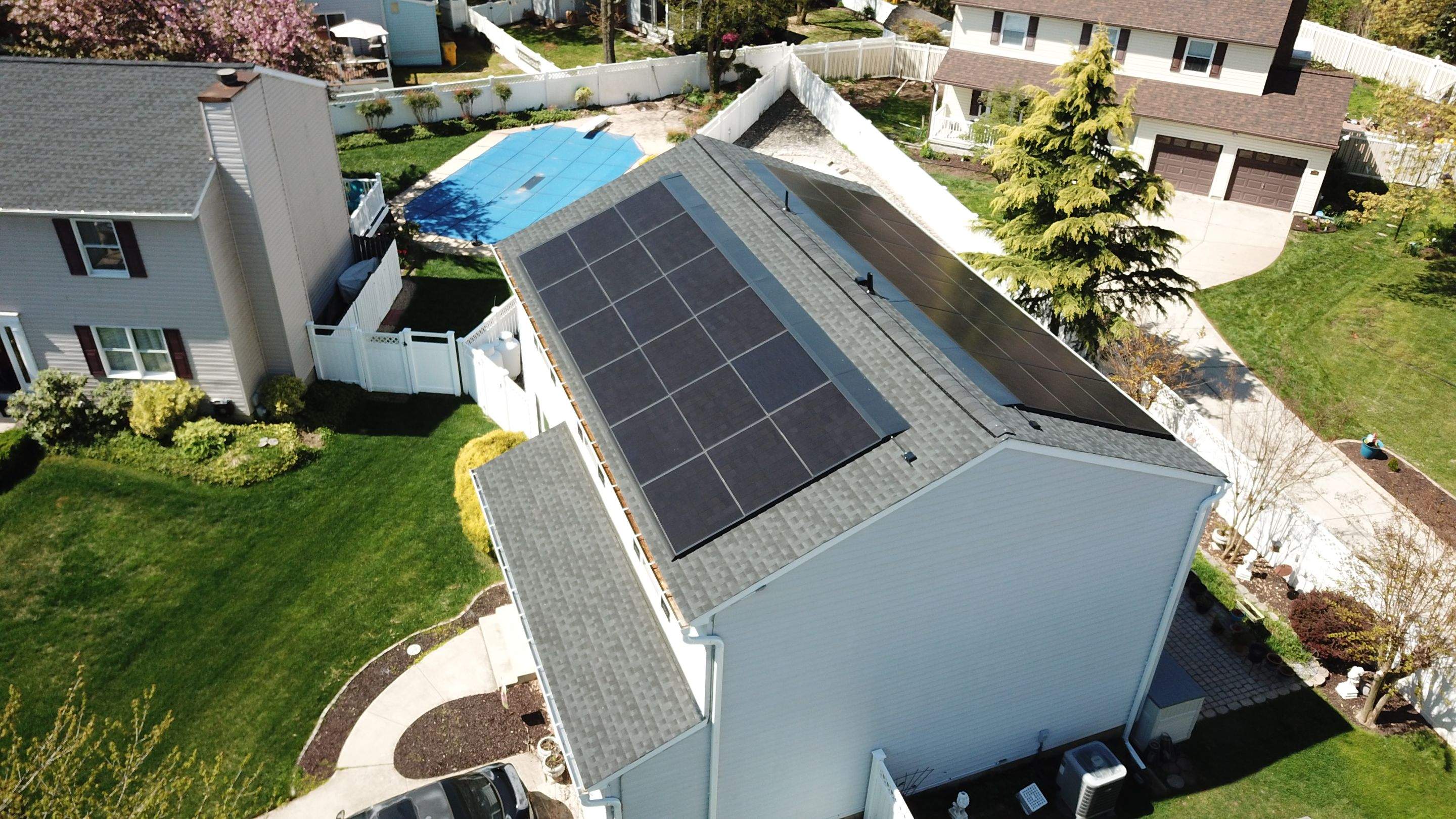 Roof Replacement with GAF Decotech integrated solar panels by American Home Contractors