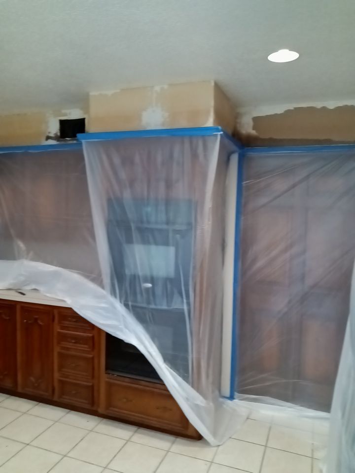 Interior and exterior painting project by Roof Concepts Construction