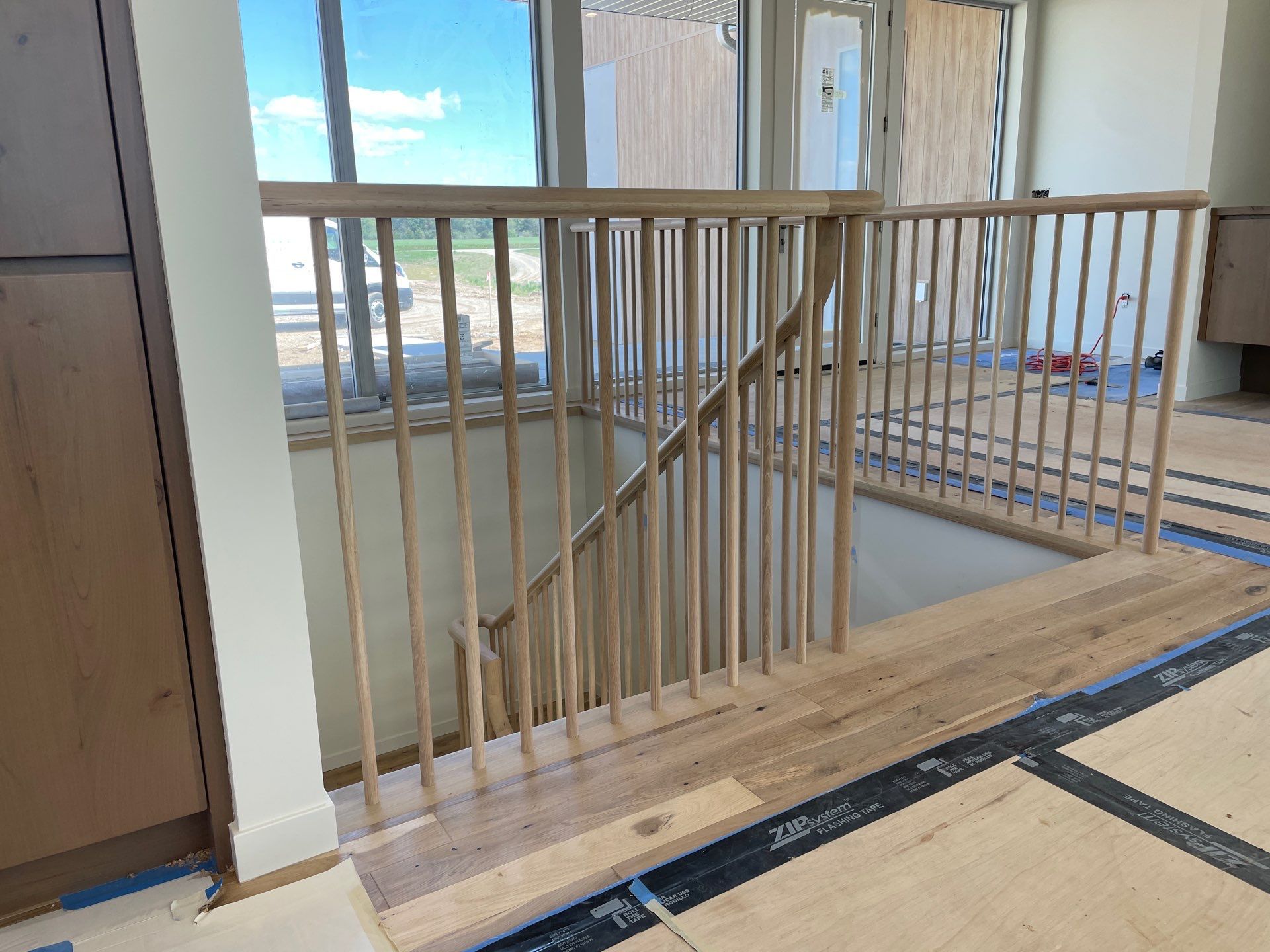 Hand Carved Staircase steals the show by RTBaldwin Hardwood Floors