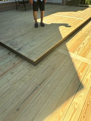 Pressure-Treated Deck Resurface with Black Aluminum Balusters in Broadway